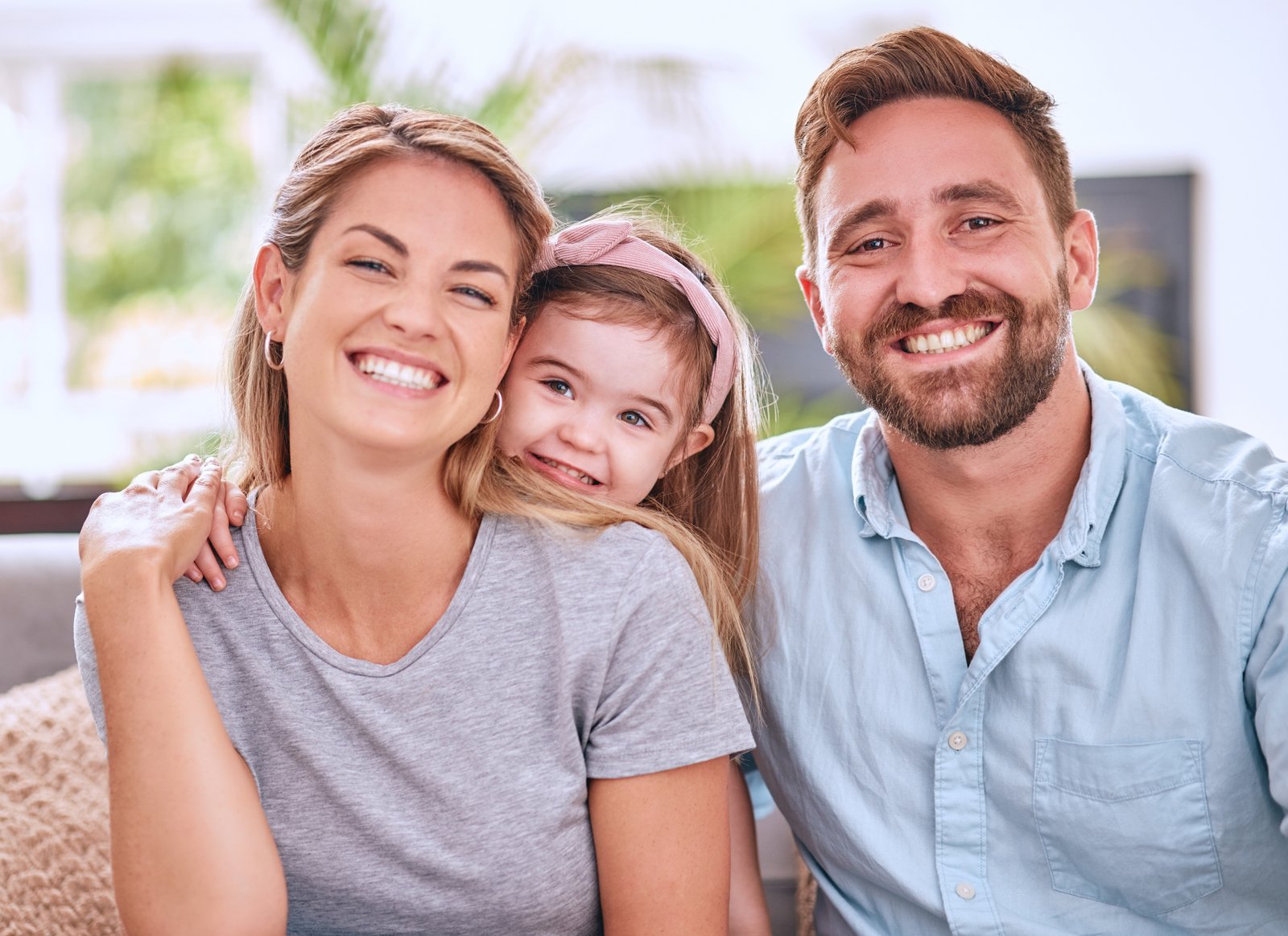 A family smiling together at Duo Dental in Brampton